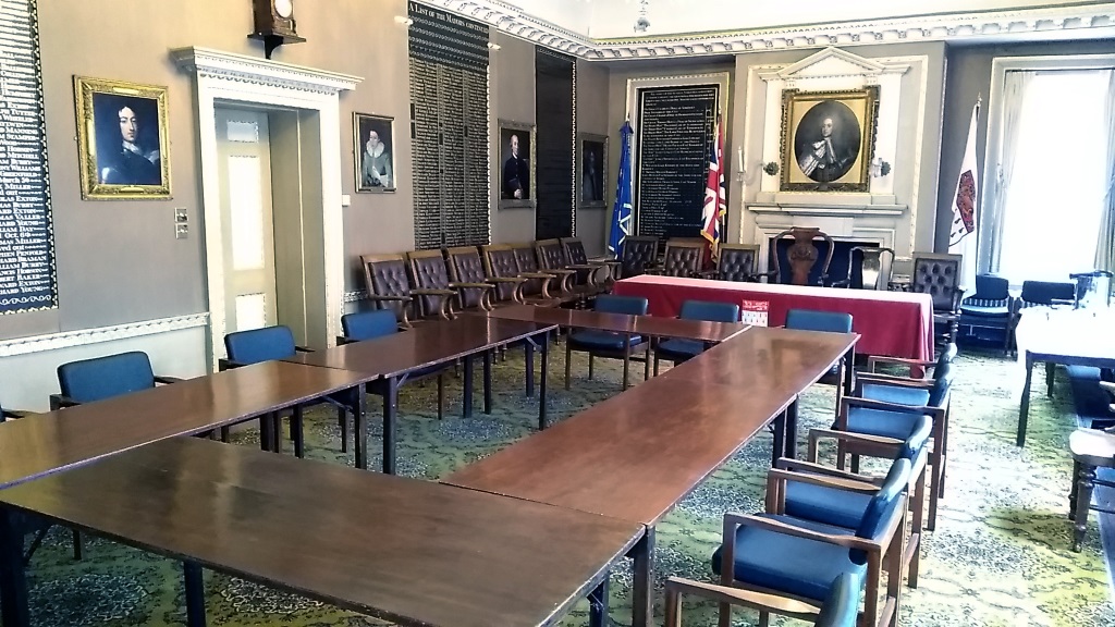 The Council Chamber set up for committee meetings with the Mayoral table set up in the background