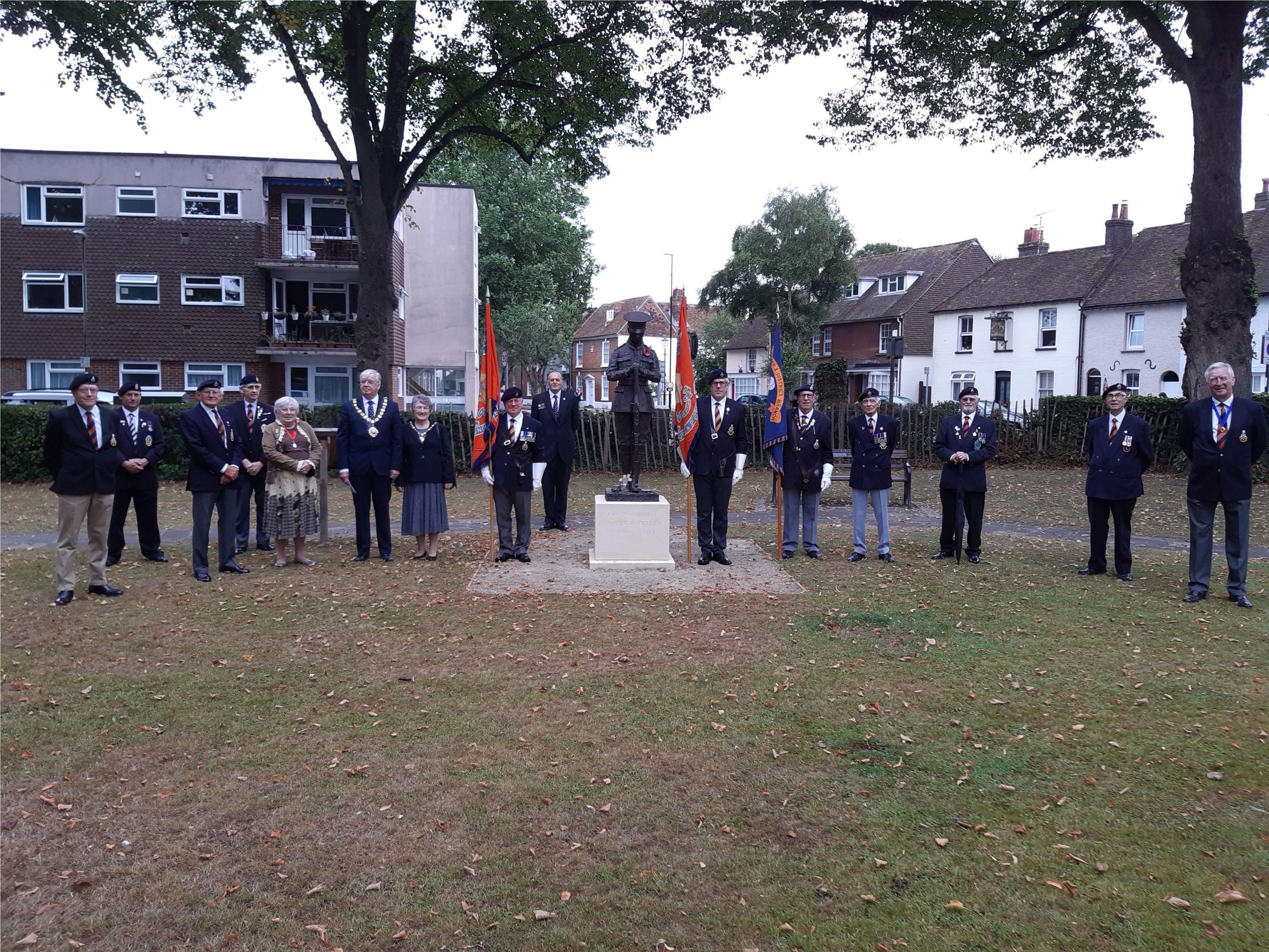 Image showing Royal Sussex Regiment veterans accompanied by Chichester City Councillors Scicluna, Plowman and Bell, unveiling the statue of Maurice Patten, November 2019