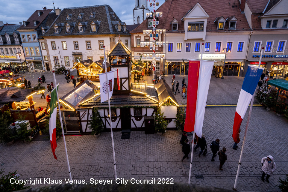 Speyer Town Square showing the four twinned city flags - December 2022