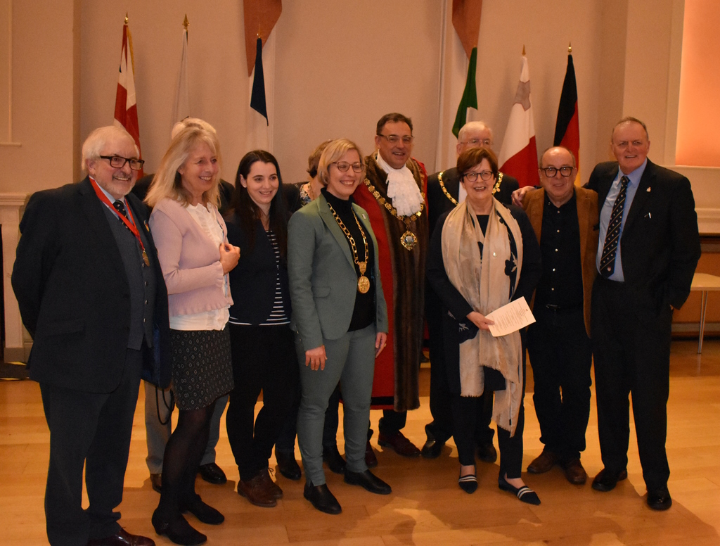 Group photo at the signing of the Chichester-Speyer Twinning Deed - left to right, Chichester City Councillor Craig Gershater, Friends of Chichester representative Kathrin Kirsch, Civic Officer, Speyer, Sabrina Koob, Mayor of Speyer, Stefanie Seiler, Mayor of Chichester, Councillor Julian Joy, Deputy Mayor of Speyer, Monika Kabs, Deputy Mayor of Chichester, Councillor Richard Plowman, Director of Culture, Tourism, Education and Sport, Speyer Dr Matthias Nowack, Chichester City Town Clerk, Rodney Duggua