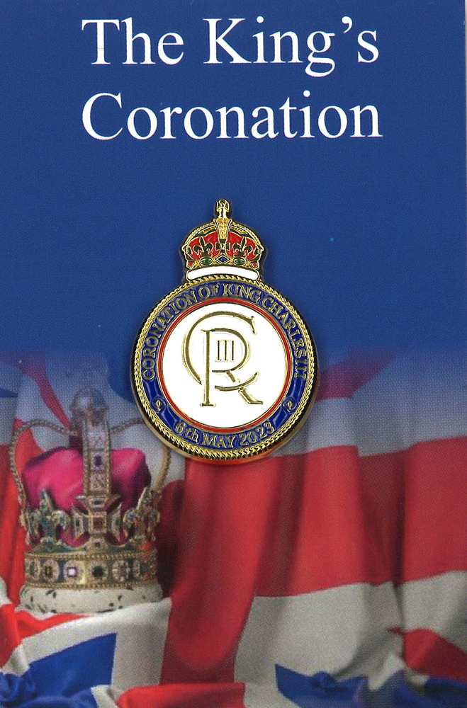King Charles III Coronation celebration pin badge on Union Flag backing card