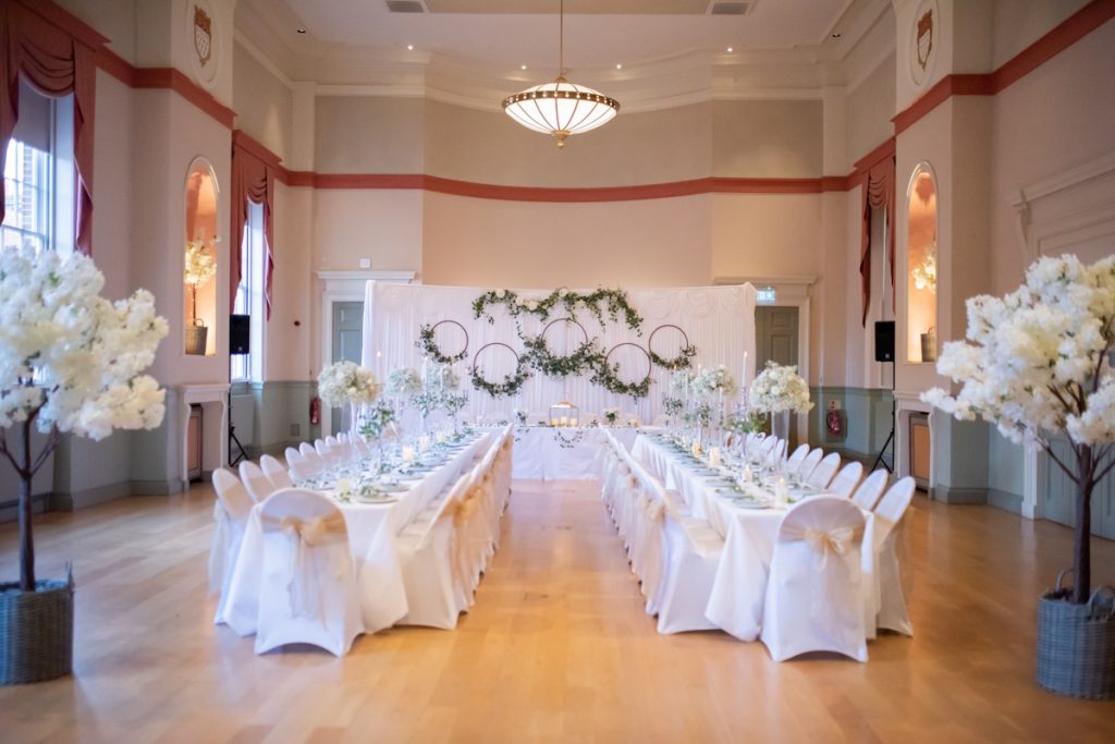 Photo of the Assembly Room, set up for a wedding reception, taken from the main entrance.