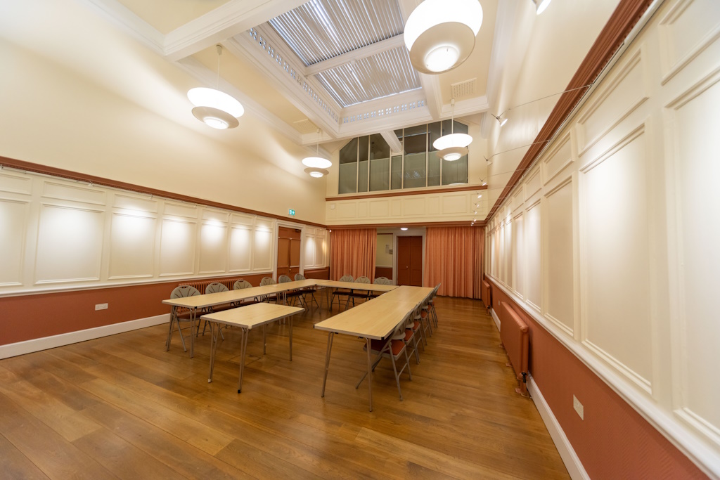 Photo showing Old Court Room set up committee meeting style, taken from the front of the room