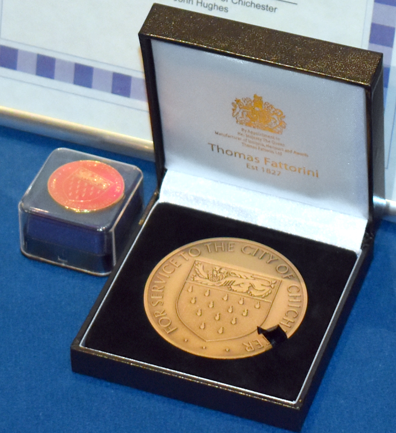 Image showing Chichester City Council Civic Award medallion and Youth Award badge