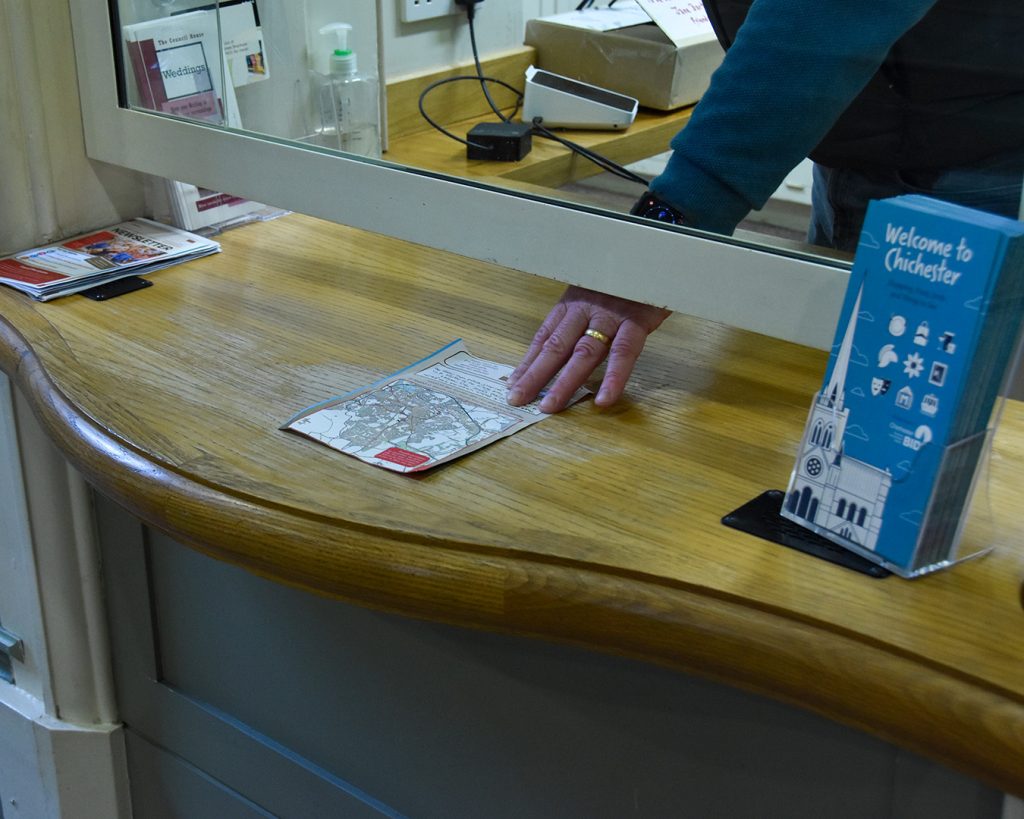 City Council Staff receiving a survey at The Council House.