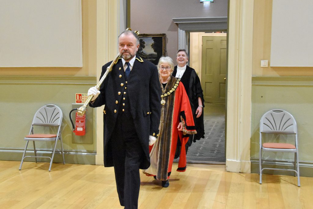 Mace Bearer leading the Mayor and Town Clerk into the Assembly Room