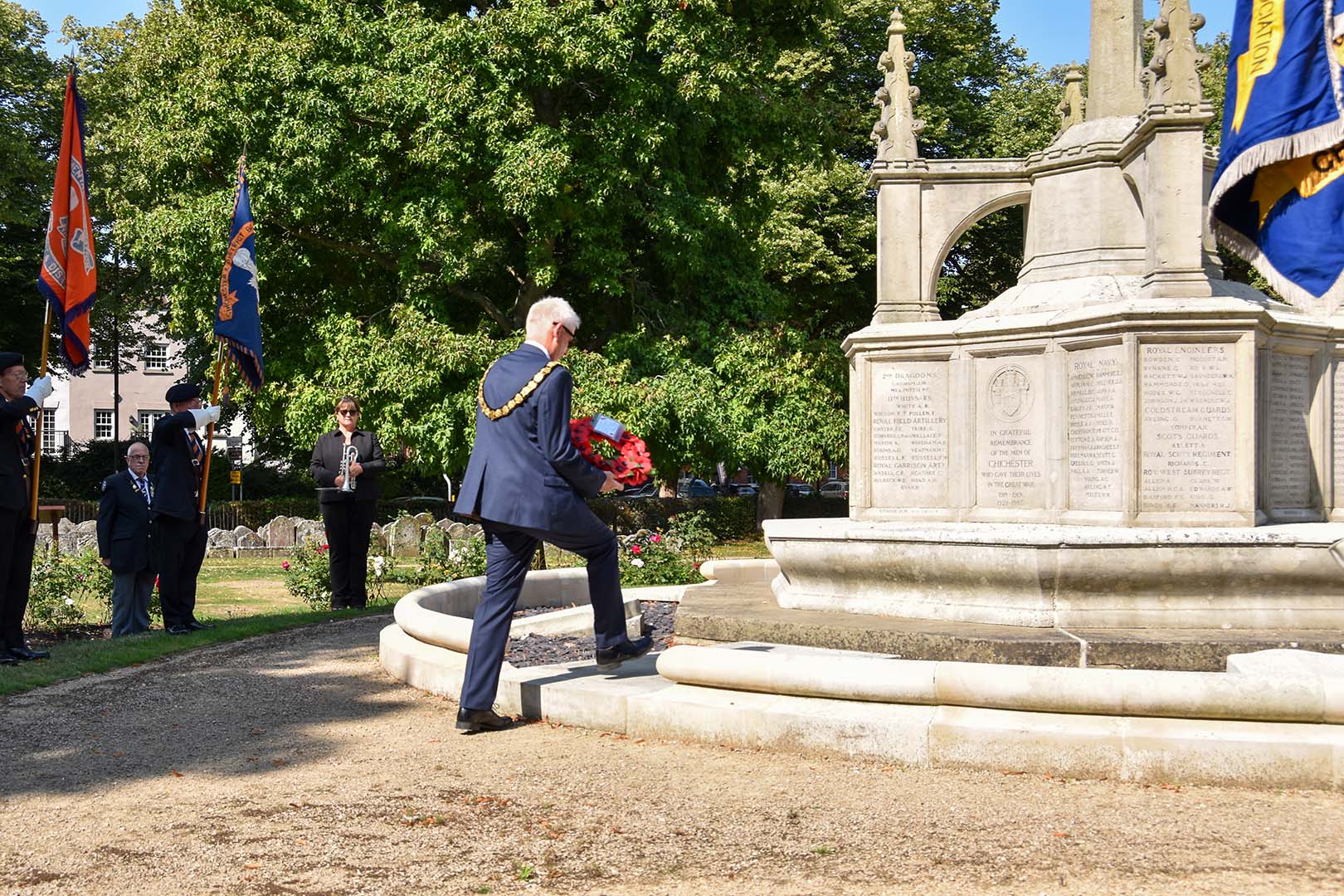 Photo of the Mayor, Councillor Sean McHale laying a wreath at the VJ Day Service at Litten Gardens