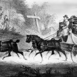 Photo of a stage coach, taking passengers to a destination.